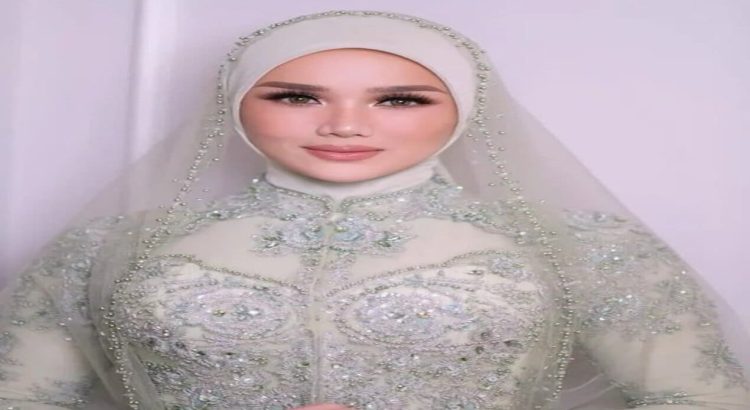 Mulan Jameela Tampil Anggun di Ngunduh Mantu